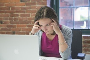 woman looking at computer