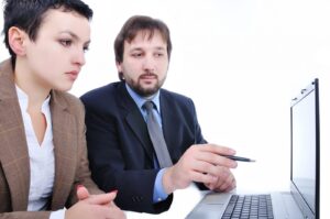 nurse and attorney looking at monitor