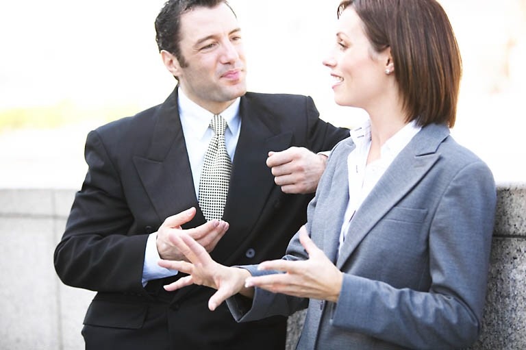 man and woman in business suits