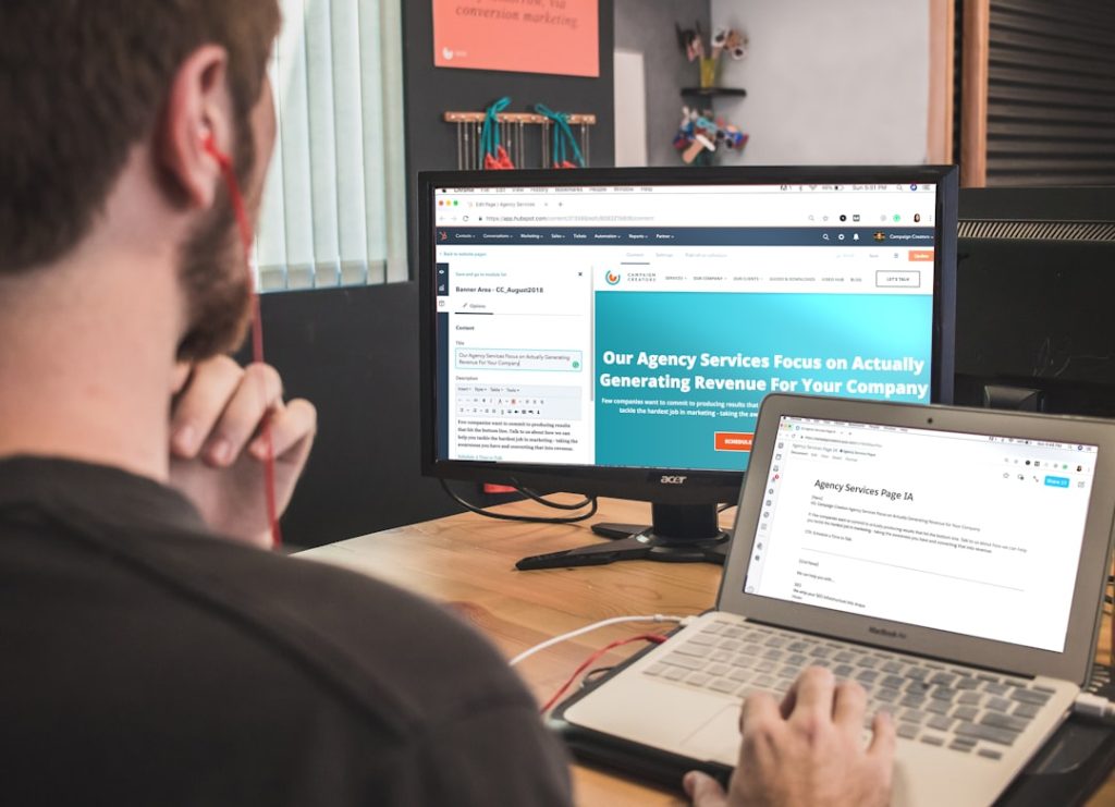 man looking at computer